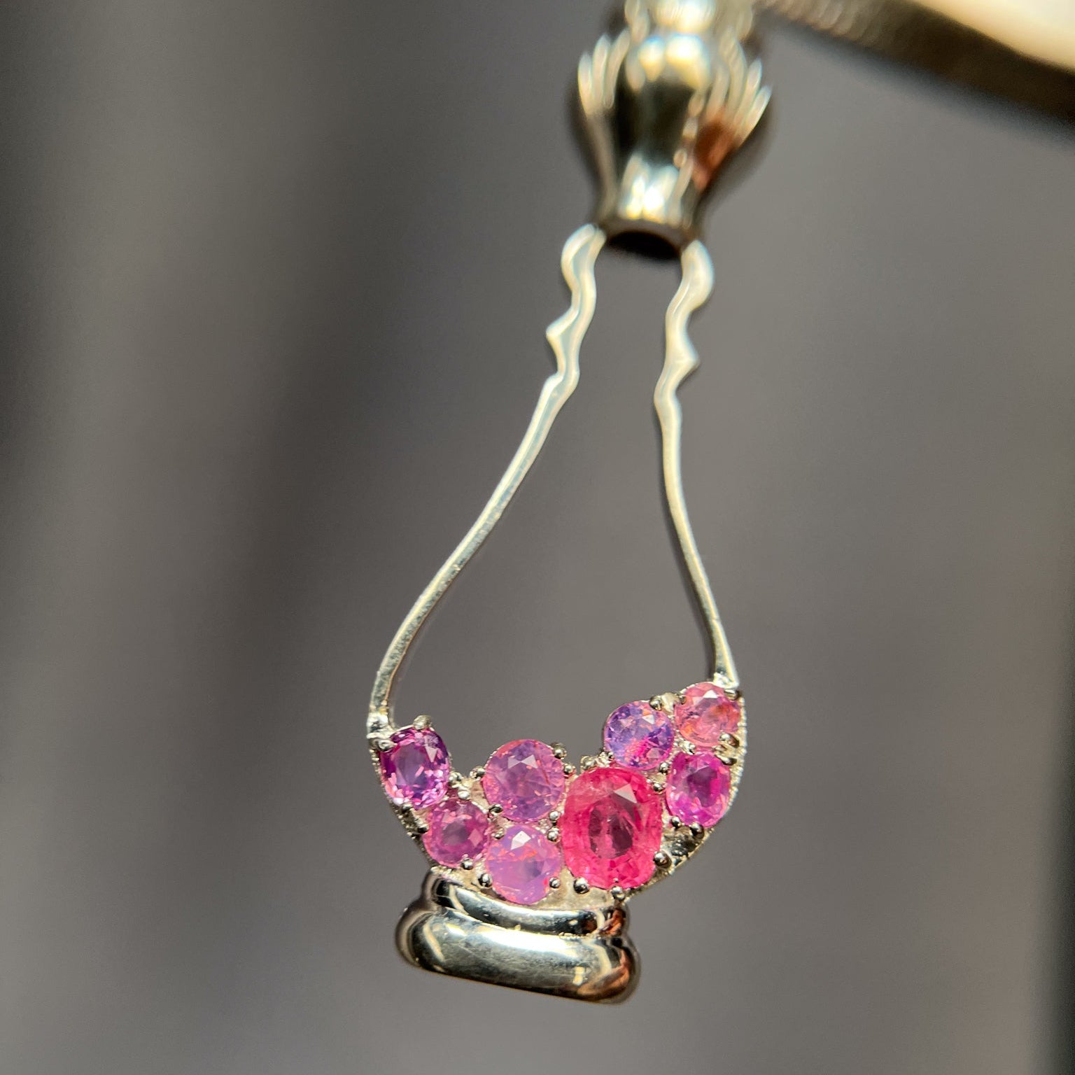 Perfume-shaped pendant