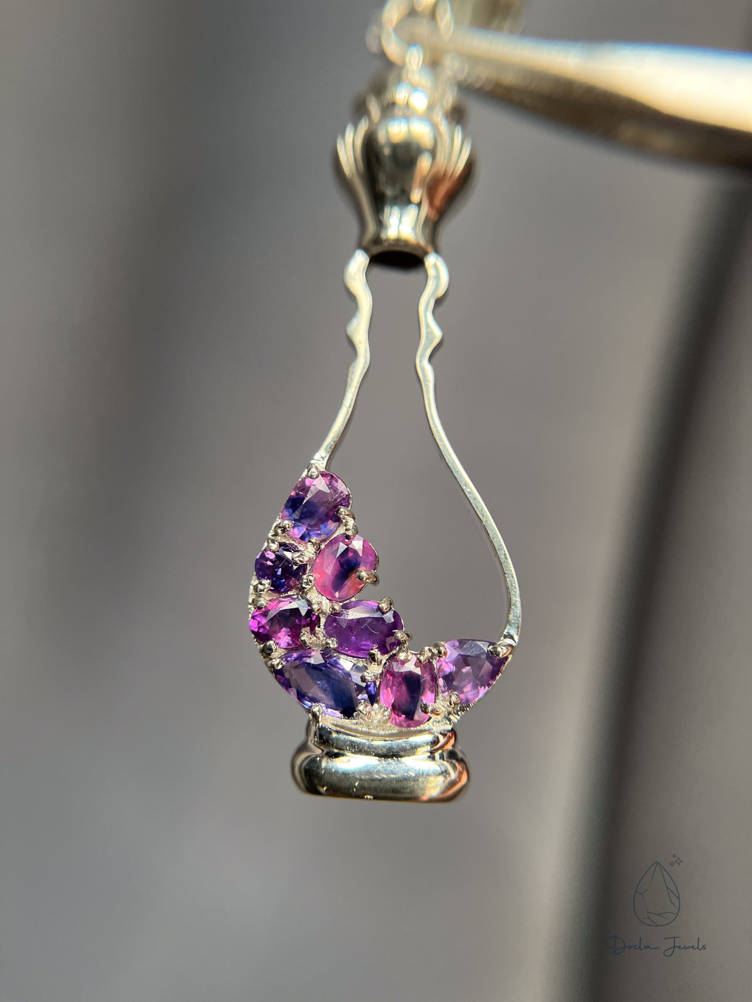 Perfume-shaped pendant