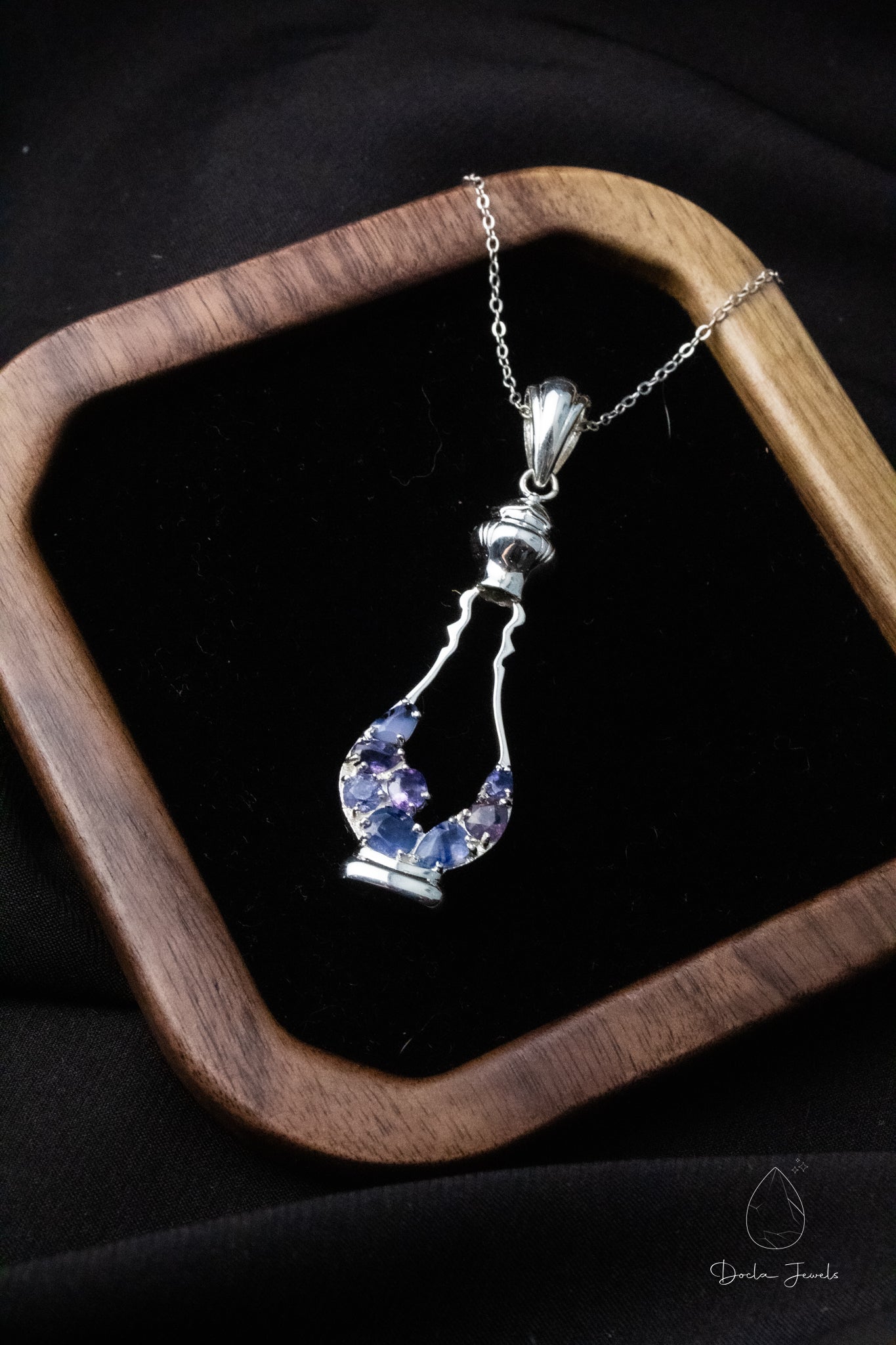 Perfume-shaped pendant