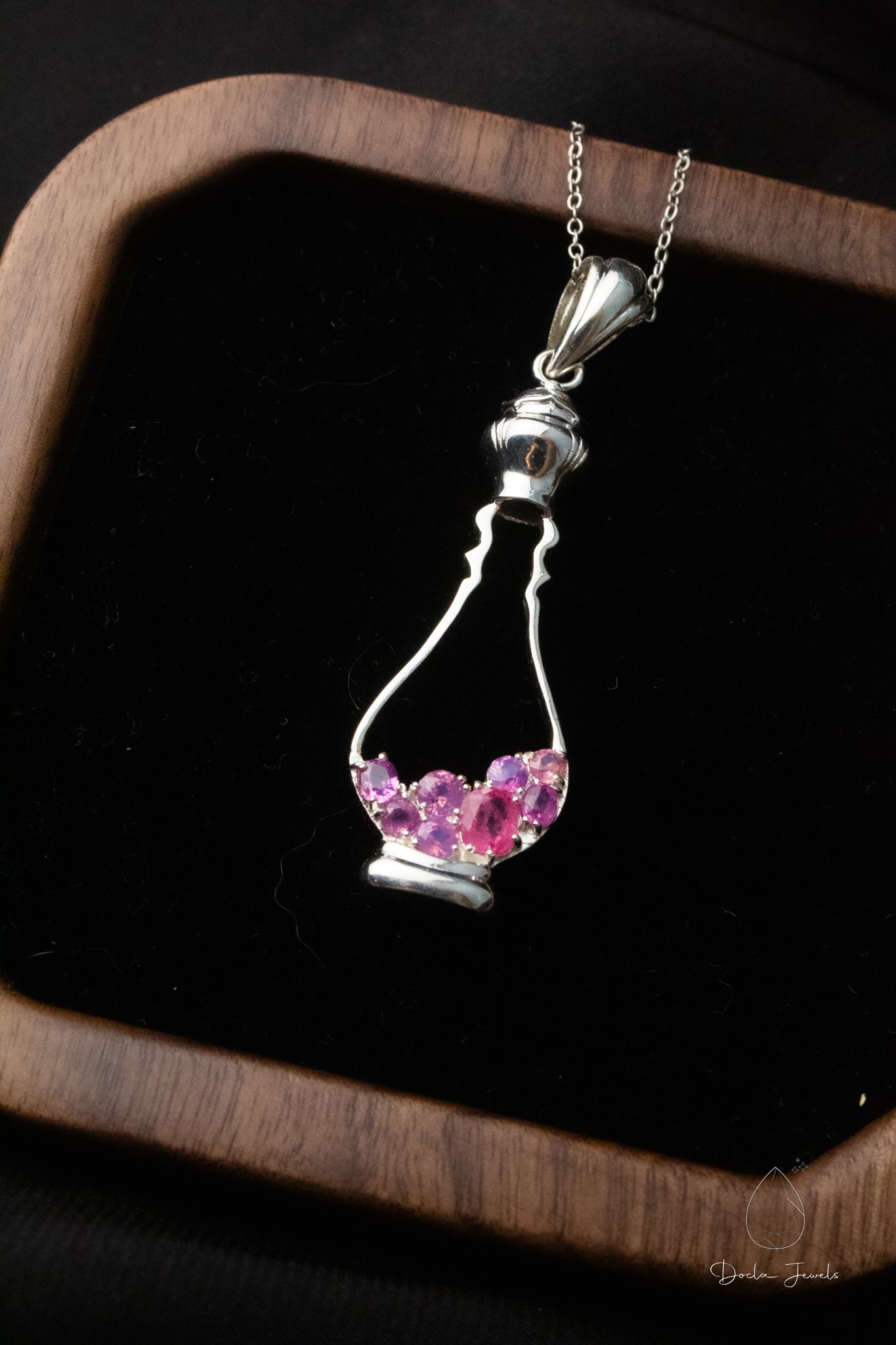 Perfume-shaped pendant