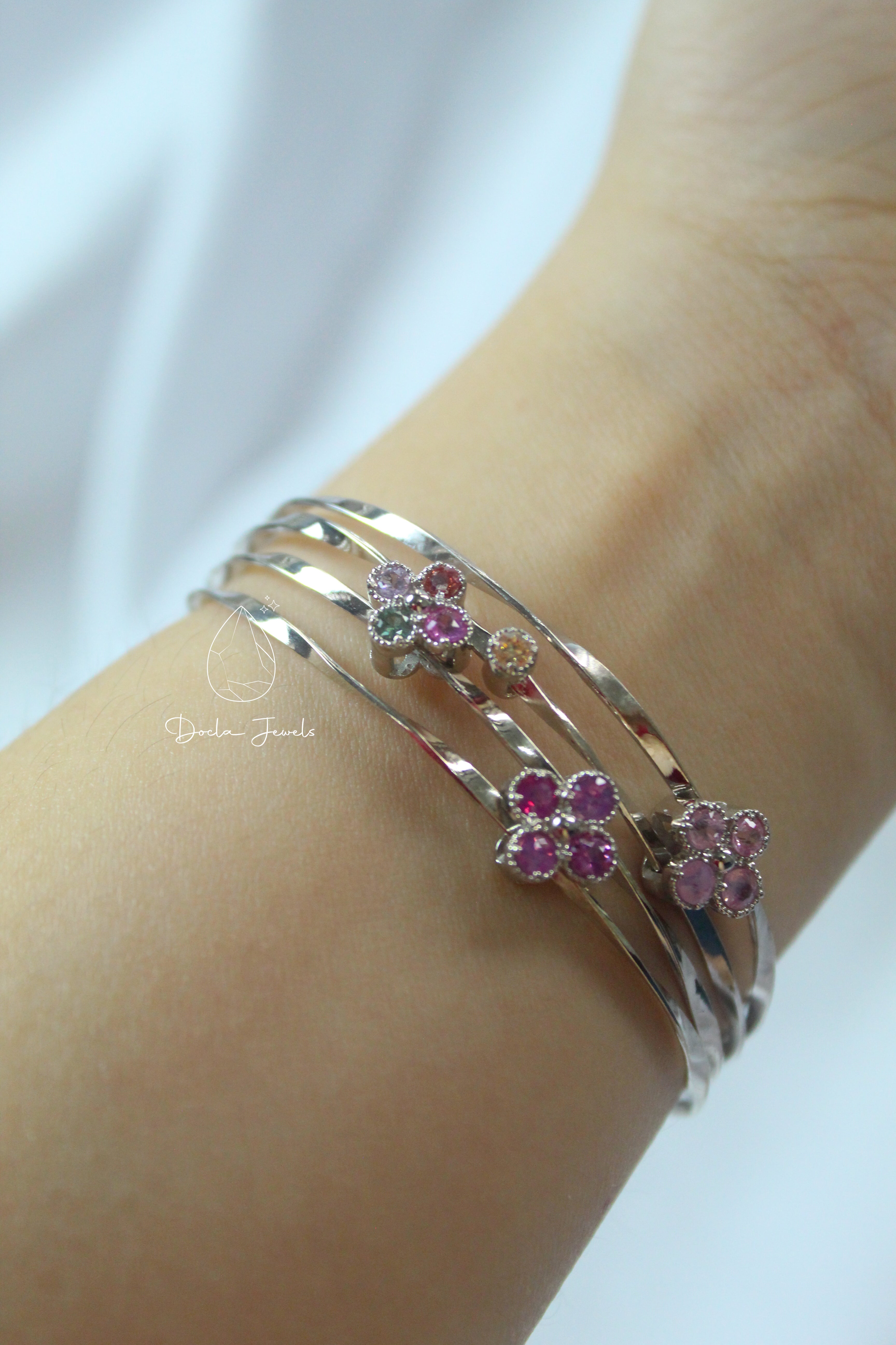 Elegant Multi-Strand Bracelet with Rainbow Sapphire Clusters
