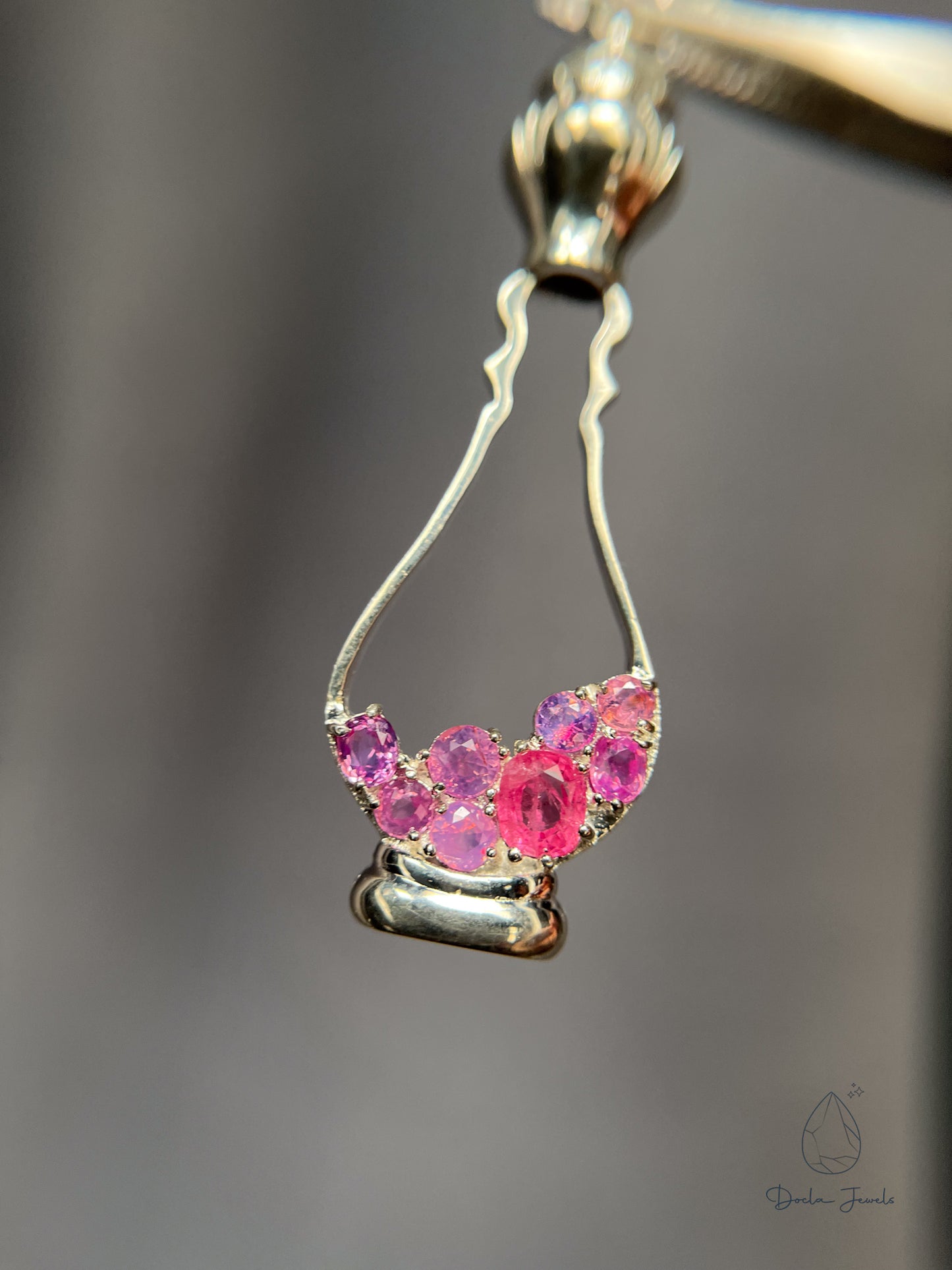 Perfume-shaped pendant