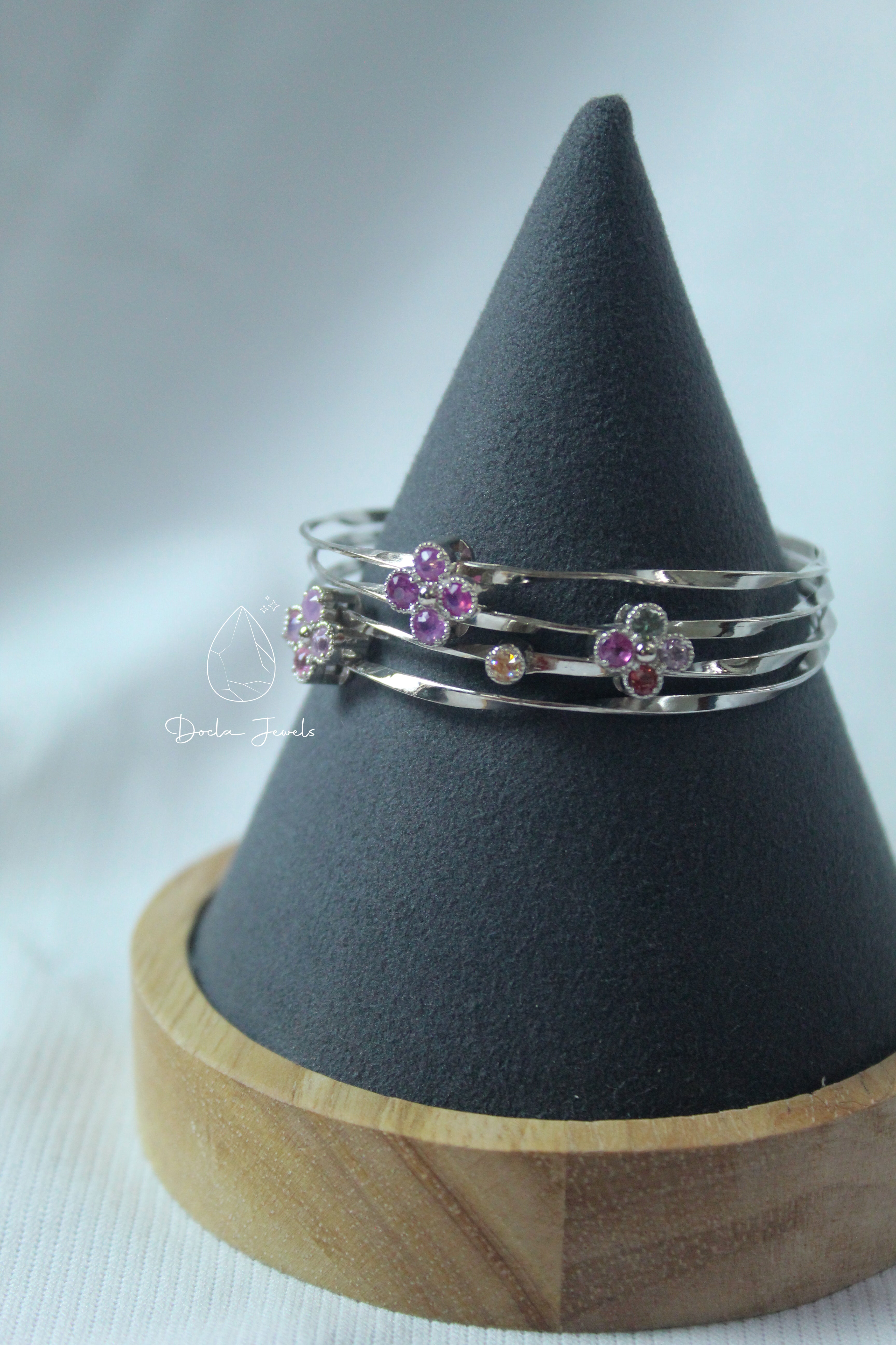 Elegant Multi-Strand Bracelet with Rainbow Sapphire Clusters